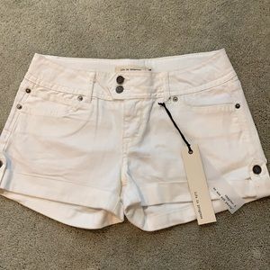 low- waisted white jean shorts